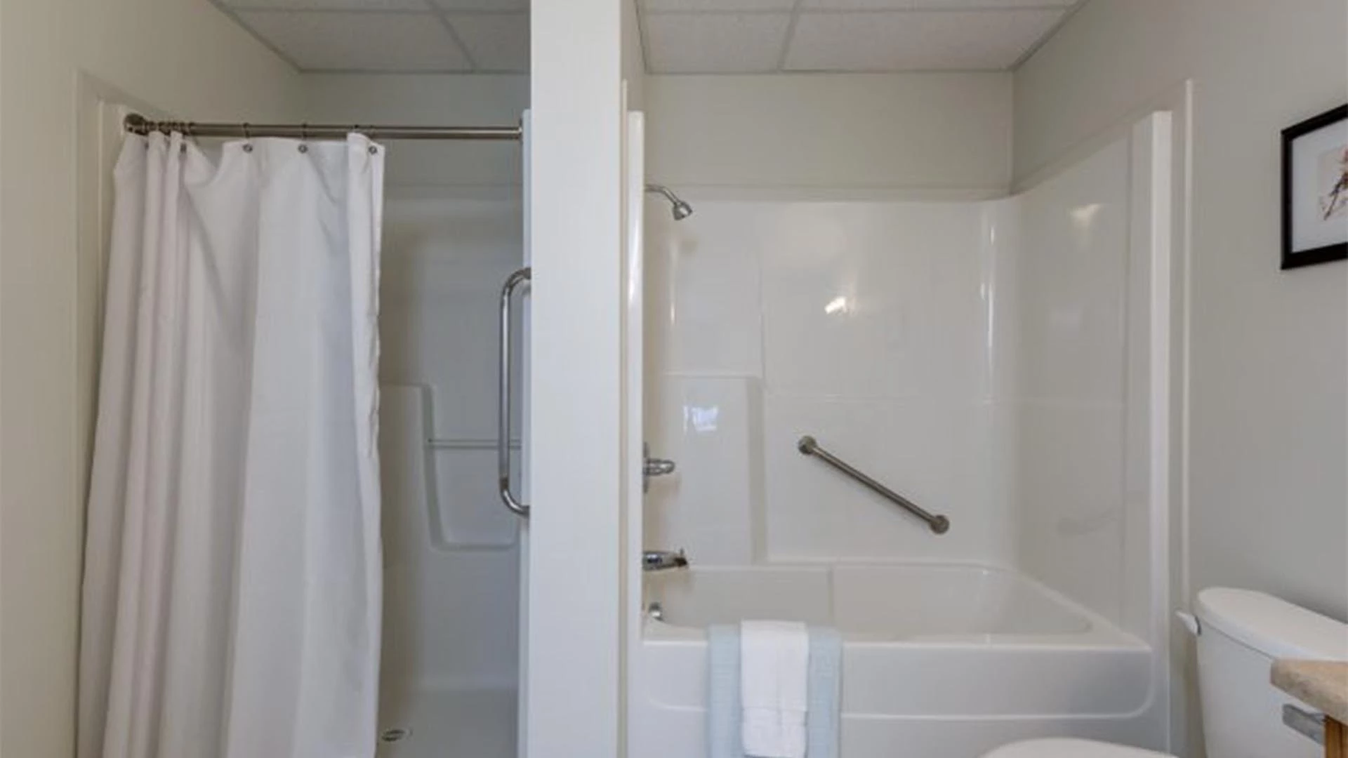 Rutherford Heights senior apartments bathroom with large tub and walk-in shower